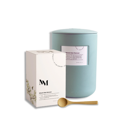 Photo of Miracle Stain Remover, with one sea green jar and wooden spoon