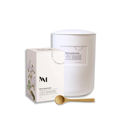 Photo of Natural Laundry Powder with one white jar and wooden spoon